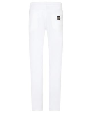 Slim white jeans with logo plate DOLCE & GABBANA